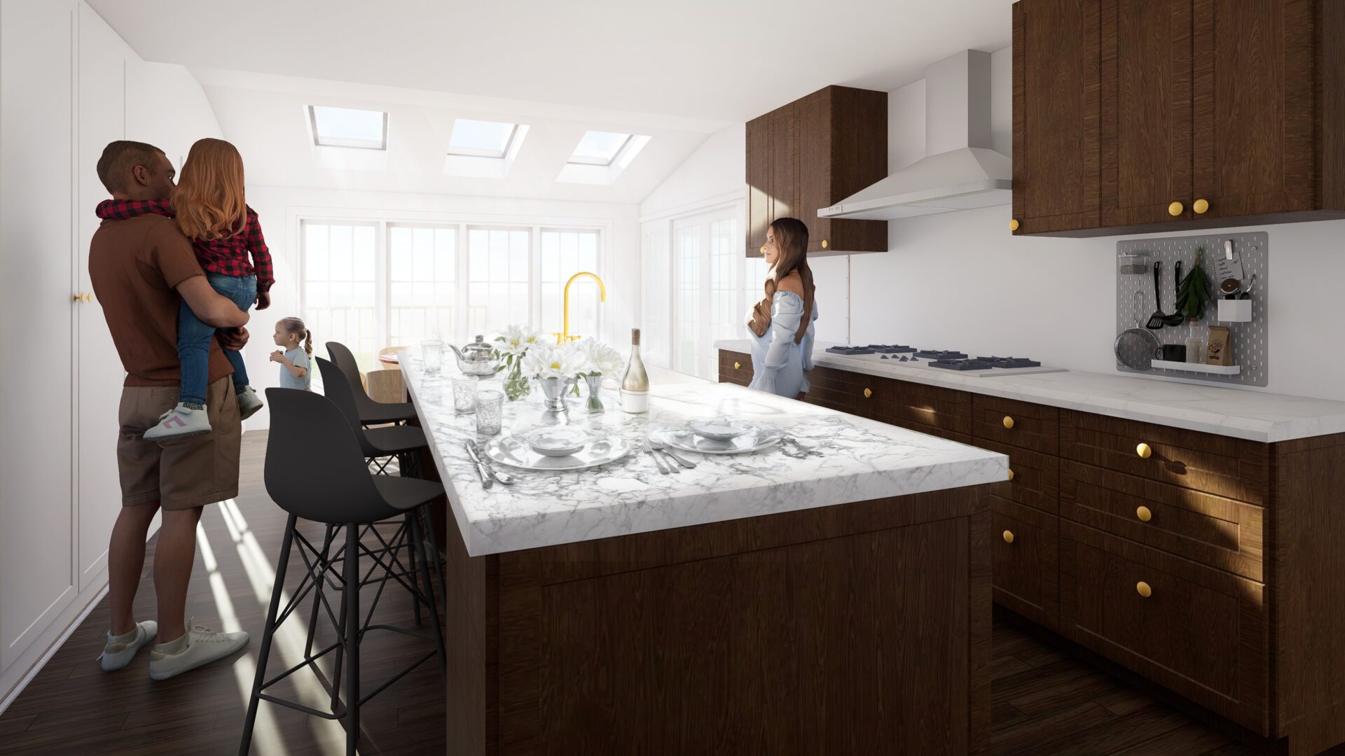 View across the East Williston House kitchen island set for a meal, with marble counters, wood cabinets and skylights