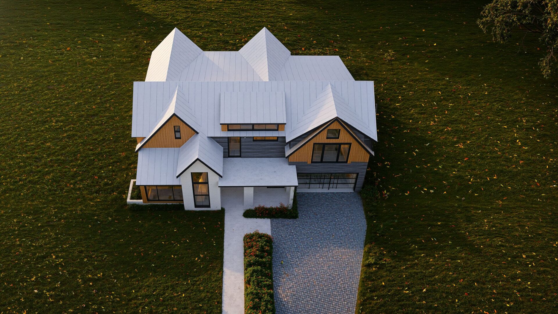Rendering of Buckley House from above, Westbury, NY, showing its gables and metal roofs